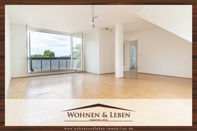 ÜBER DEN DÄCHERN: Lichtdurchflutete und gepflegte Eigentumswohnung, zentral & zugleich schön gelegen