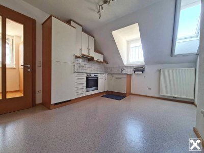 4 Zimmer-Dachgeschosswohnung mit Gartenanteil in Kennelbach!
