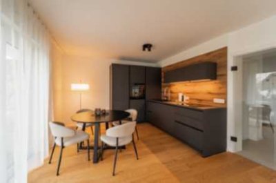 Großzügige 2 Zimmer EG - Neubauwohnung - Gartenanteil - zentrale Lage