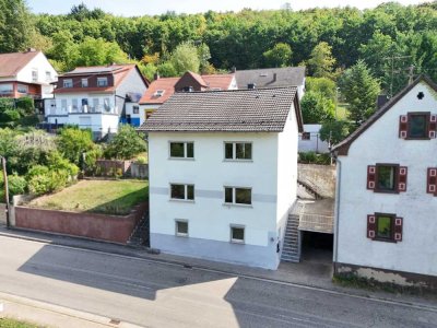 Einfamilienhaus mit Terrasse, Garten und Garage