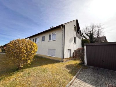 2 ½-FAMILIENWOHNHAUS
MIT GARTEN UND 3 GARAGEN
