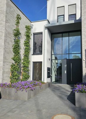Erstbezug: Moderne, großzügige 3-Zimmer EG-Wohnung mit Süd-Terrasse in Kleinenbroich