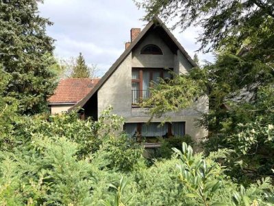 Einfamilienhaus mit Potential und ehemaligem Werkstattgebäude zum Ausbau auf 1.169 m² Gr