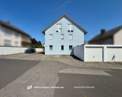 Erdgeschoss Zwei-Zimmer-Wohnung mit Terrasse und Stellplatz