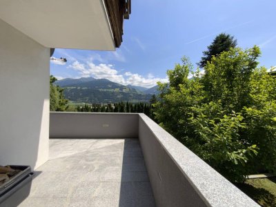 Haushälfte mit 140m² Wohnfläche und großem Gartenanteil - Terfens - für Familien.