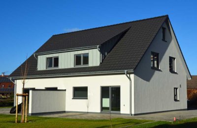 Modern wohnen und günstig mit Erdwärme heizen, große Garage