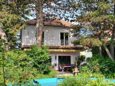 Charmantes Einfamilienhaus in Bestlage von Wien-Mauer – mit Pool, Garten und viel Privatsphäre | ZΞLLMANN IMMOBILIEN