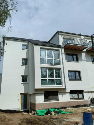 Traumhafte Dachwohnung mit Blick ins Grüne (Erstbezug)