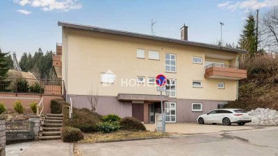 Möblierte 1,5-Zimmer-Wohnung mit Balkon und Tiefgaragenstellplatz in ruhiger Waldrandlage