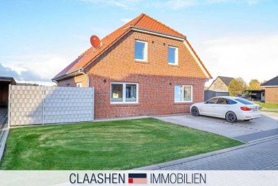 Gehobene Erdgeschosswohnung im 2-Parteien-Haus