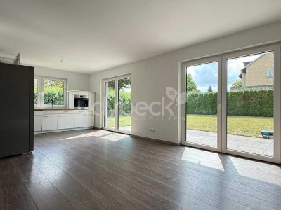 Moderne 3-Zimmer-Erdgeschosswohnung  mit hochwertiger Ausstattung, Garten und Stellplatz.