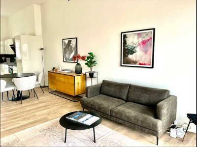 2-Zimmer-Mietwohnung mit Dachterrasse, Kellerersatzraum und Parkhaus-Stellplatz