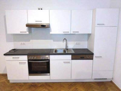 Sonniger 2 ZIMMER-NEUBAU + neuwertige Einbauküche + neuwertige Sanitäranlagen (Bad + WC)!