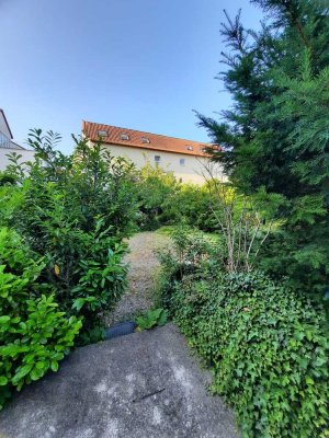 Traumhafte 2 Zimmerwohnung mit Terrasse und Garten