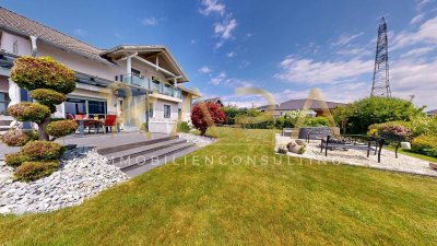 Stilvolle Familienresidenz mit Fernblick und idyllischer Gartenoase