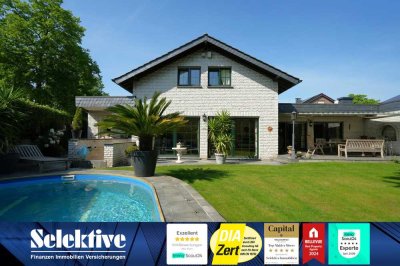 Exklusives Wohnensemble mit Südlage, Pool & Kamin – Stilvolles Einfamilienhaus in Toplage