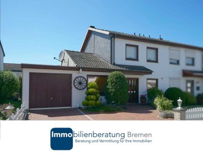 Charmante Doppelhaushälfte mit Garten und Garage