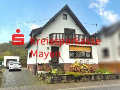 Charmantes Einfamilienhaus mit Garage, Garten und Nebengebäuden