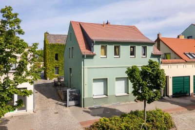 Vielseitiges Wohn- und Geschäftshaus in zentraler Lage von Werder
