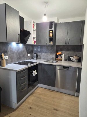 Moderne 2-Zimmer-Neubau-Wohnung mit Balkon & Tiefgarage /  1. Stock