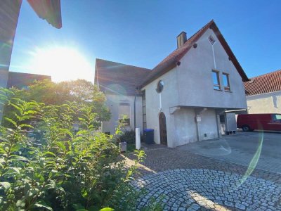 Großflächiges Wohn- und Geschäftshaus mit Tiefgarage, Backstube und bewohnter Fläche in OG und DG