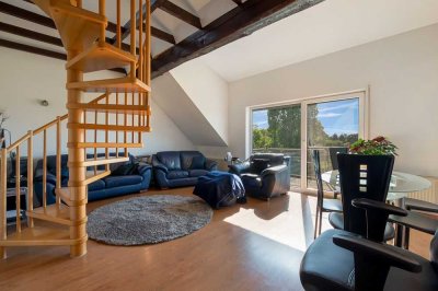 Kapitalanlage mit Aussicht – Vermietete 3,5-Zimmer-Dachgeschosswohnung mit Stellplatz