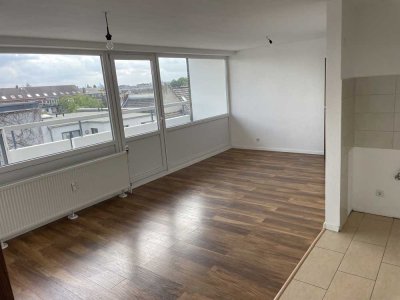 Lichtdurchflutete 2-Raumwohnung mit offener Küche