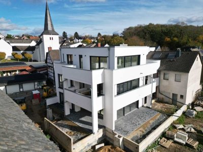 Architektonische Klarheit trifft Wohnkomfort – Erdgeschosswohnung mit Garten & Aufzugsdirektzugang