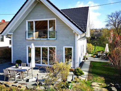 Exklusives und repräsentatives Masssivholzhaus in Oberdürenbach