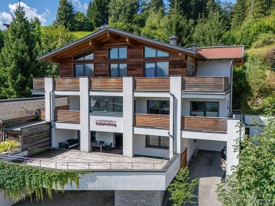 Naturnah &amp; zentral: Stilvolle 4-Zimmer Erdgeschosswohnung mit großer Terrasse in Ski amadé-Nähe