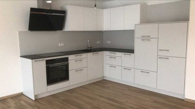 Zentrale Penthouse-Wohnung mit 2 Zimmern und Balkon