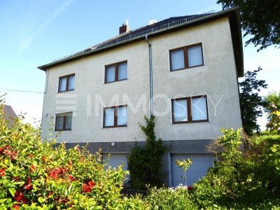 Jede Menge Platz und Potential auf 2 Etagen - 2 Garagen, Werkstatt....
