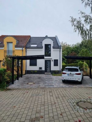 Elegantes Reihenendhaus mit 4 Zimmern und 2 Carports