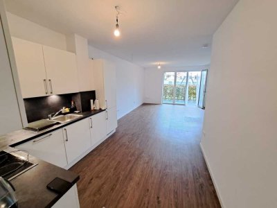 Heiligkreuzviertel: Zweizimmerwohnung mit EBK, Terrasse und Stellplatz