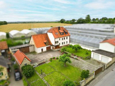 Kapitalanlage trifft Familienidylle: Attraktives Mehrgenerationenhaus mit großzügigem Grundstück