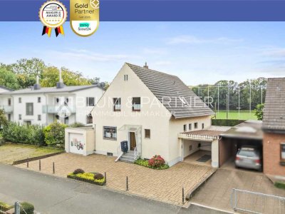 Freistehendes Einfamilienhaus mit zwei Garagen in Pulheim-Geyen mit Sanierungsbedarf