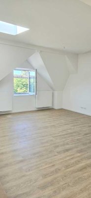 Neubau-Dachgeschosswohnung im Altbau – ökologisch & stilvoll