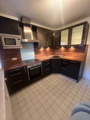 Vollständig renovierte helle 1-Zimmer-Wohnung mit Balkon und Einbauküche in Putzbrunn
