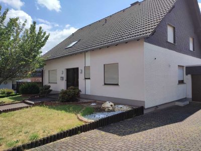 Großzügige 4,5-Zimmer-EG-Wohnung mit Südgarten und Garage in Mastershausen