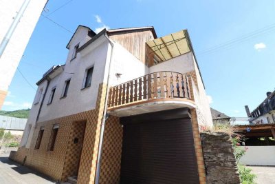 Großzügiges Einfamilienhaus mit Garten und Garage in Alf