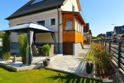 Einfamilienhaus in ruhiger Siedlungslage mit schönem Garten und Solaranlage