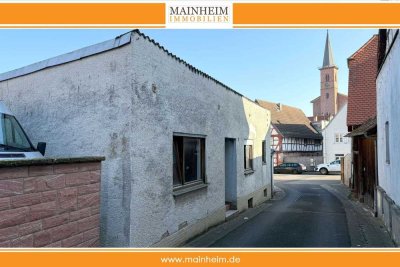 Projekt für Visionäre – Bungalow in erstklassiger Lage mit Sanierungsbedarf