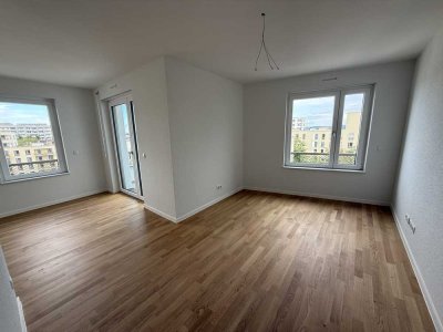 Neubau-Erstbezug: Moderne, teilmöblierte 2-Zimmer-Wohnung mit Balkon und EBK in Karlsruhe