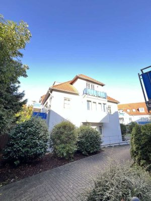 Ideale Kapitalanlage + 2 leerstehende Dachgeschosswohnungen mit TG-Stellplätzen in Toplage