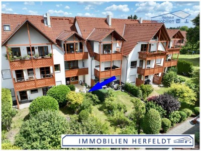 Wohnoase im Grünen – Gepflegte 2-Zimmer-Gartenwohnung mit TG-Stellplatz - sofort bezugsfrei