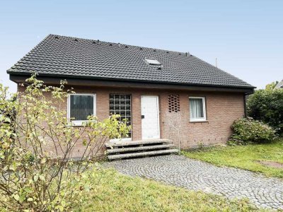 Großzügig aufgeteiltes Einfamilienhaus mit Vollkeller und Garage in ruhiger Lage von Reckenfeld!