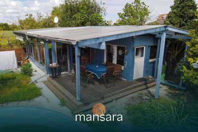 Familienhaus mit separatem Ferienhaus in idyllischer Lage – Vielseitiges Zuhause auf 3 Ebenen