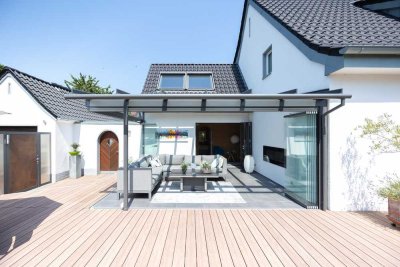 Einziehen und wohlfühlen: Stilvolles Einfamilienhaus mit traumhaftem Sommergarten