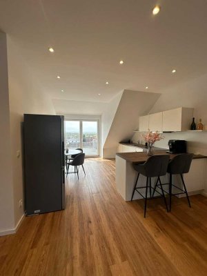 Wunderschöne Dachgeschosswohnung mit Blick auf Rheinebene!