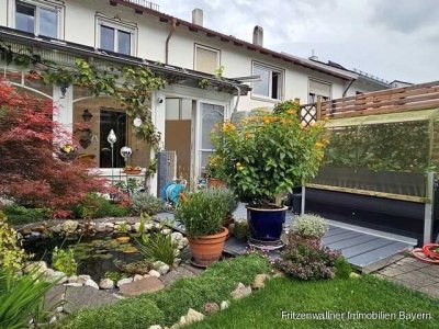 Wohnen mit Wohlfühlfaktor: Modernes Reihenhaus mit Kamin und Gartenoase